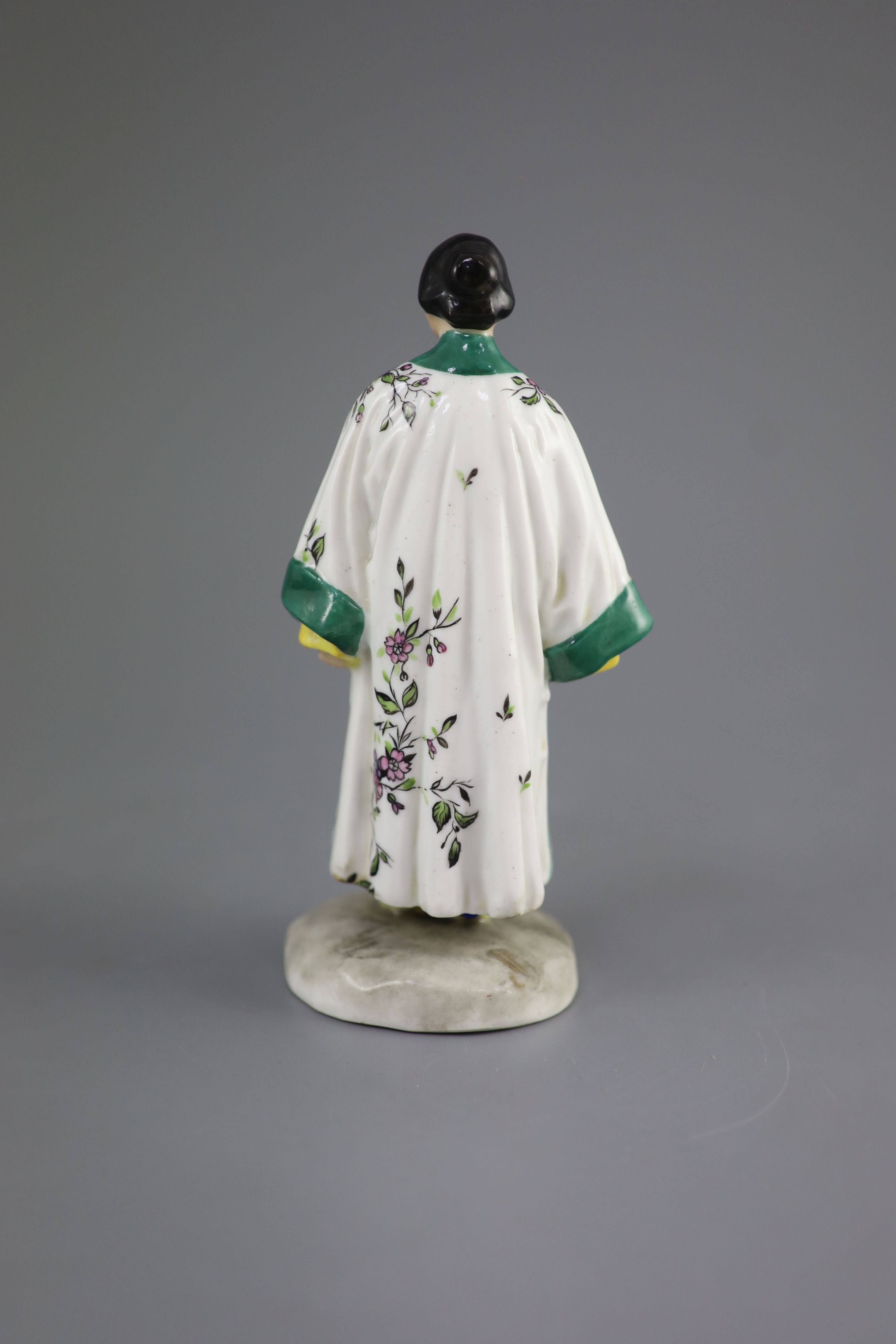 A Russian porcelain figure of a fashionable Chinese lady, Lomonosov factory, early 20th century, 18.3 cm high